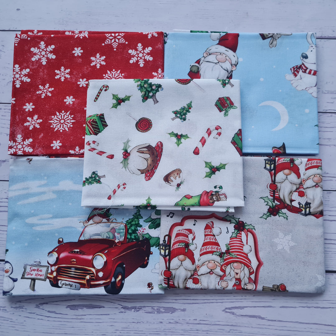 Driving Gnome for Christmas cotton fat quarter bundle of 5 quilting fabrics.