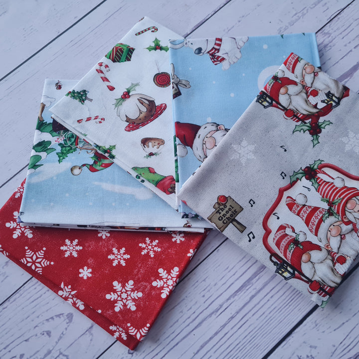 Driving Gnome for Christmas cotton fat quarter bundle of 5 quilting fabrics.