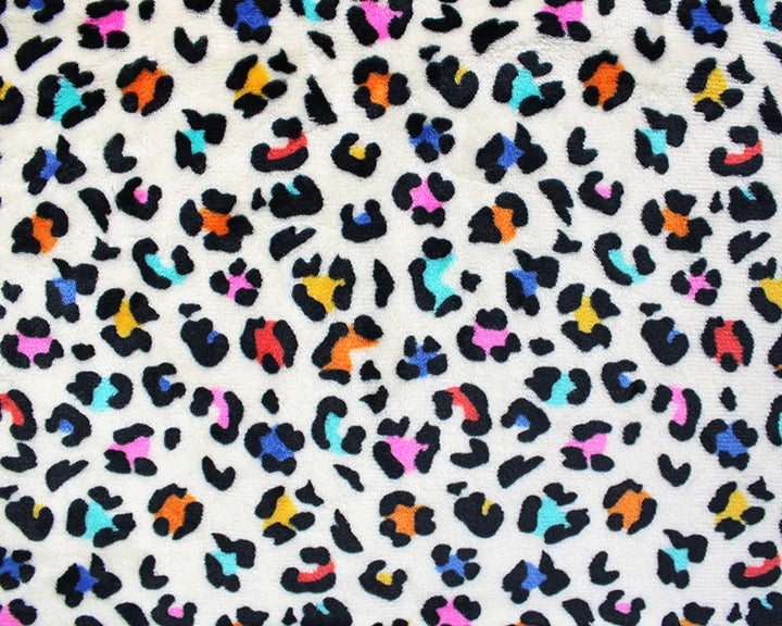 Leopard print cuddle polar fleece soft fabric. Multicolour on cream x 1/2 m.