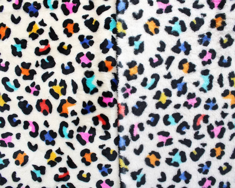 Leopard print cuddle polar fleece soft fabric. Multicolour on cream x 1/2 m.