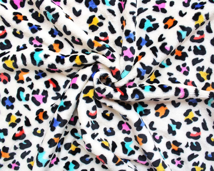 Leopard print cuddle polar fleece soft fabric. Multicolour on cream x 1/2 m.