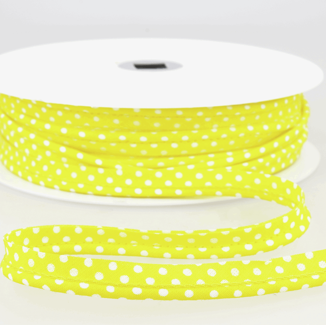 Patterned flanged 10mm wide piping cord trim 2 mm. Floral and polkadot trim. Per Metre